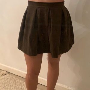 green mini skirt
